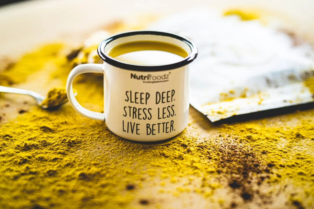 Cup of tea on a table, often linked to the Andrew Huberman sleep cocktail for better sleep quality and focus