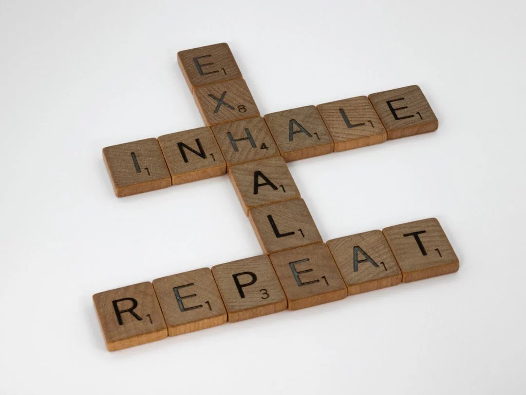 Wooden blocks on white surface illustrating common mistakes when box breathing vs 4-7-8 backfires