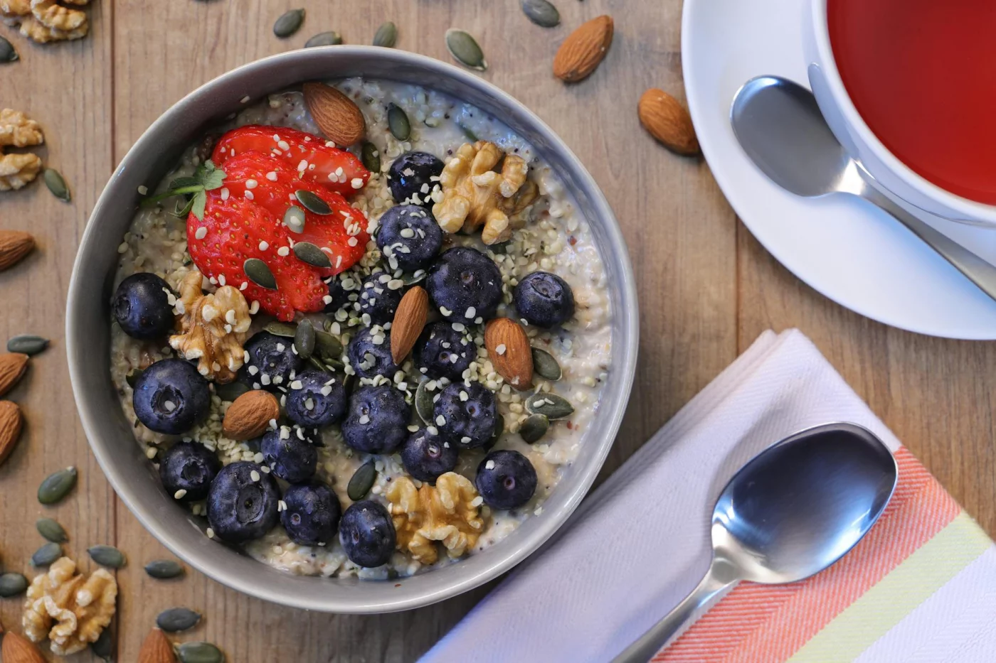 Foods for Brain Health, Memory, and Studying Breakfast bowl with berries, almonds, and walnuts as brain food for studying, memory, and concentration