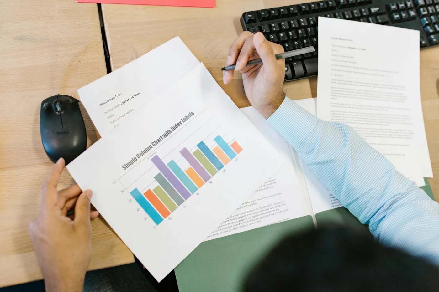 Burnout Statistics by Profession: Patterns and Risks Analyst reviewing charts on workload trends tied to burnout statistics by profession and deep work pressure