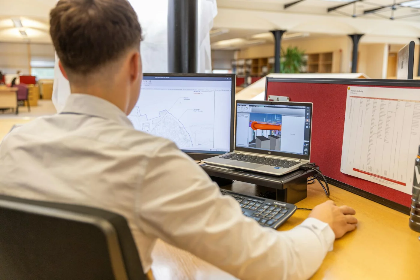 Do Blue Light Glasses Help With Eye Strain? Engineer using dual monitors for CAD; do blue light glasses help with eye strain while adjusting screen settings and breaks?