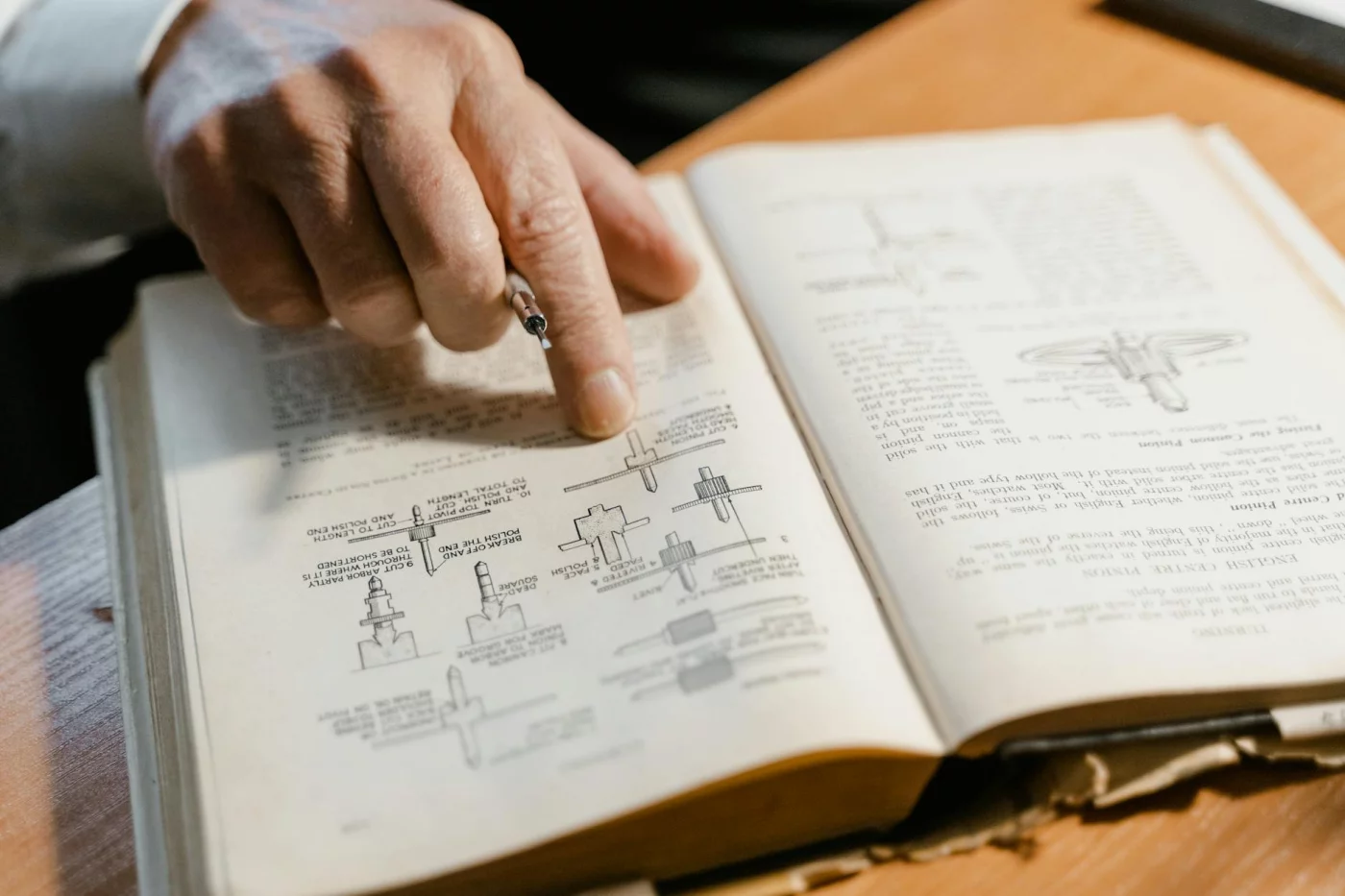 Does Speed Reading Actually Work? A Science-Based Verdict Hand pointing to a learning diagram in an open book as does speed reading work reddit explores apps, courses, and mistakes