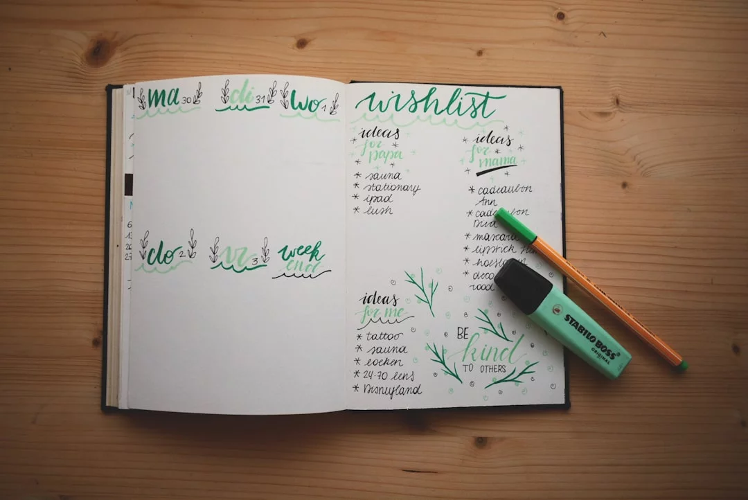 Habit Stacking Template: 7 Proven Ways to Build Routines That Stick Open notebook on a wooden desk showing a habit stacking template for work, study, and morning routines