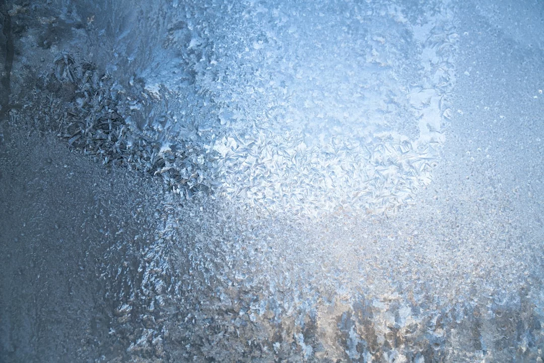 Cold Showers for Alertness and Focus: What Research Says Frosted window illustrating how long should a cold shower be for brain and nervous system cold exposure benefits