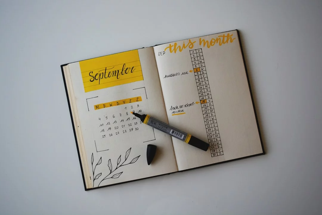 How to Learn Spanish in 6 Months: A Realistic Plan White planner and pen outlining how to learn Spanish in 6 months with clear monthly milestones