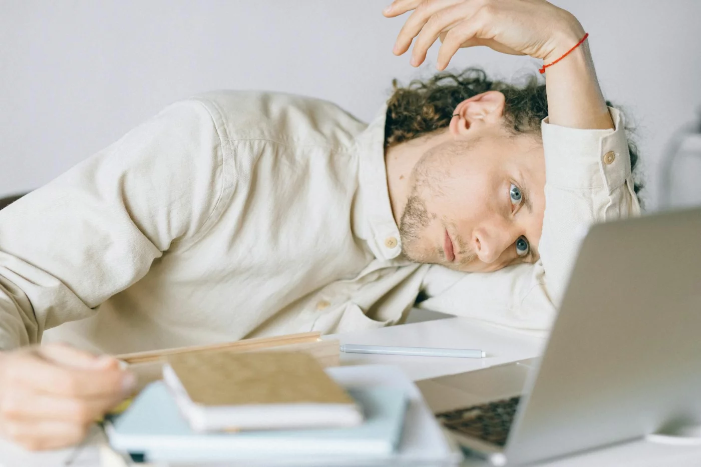 How to Recover from Burnout While Still Working Tired office worker at desk illustrating how to recover from burnout while still working step by step