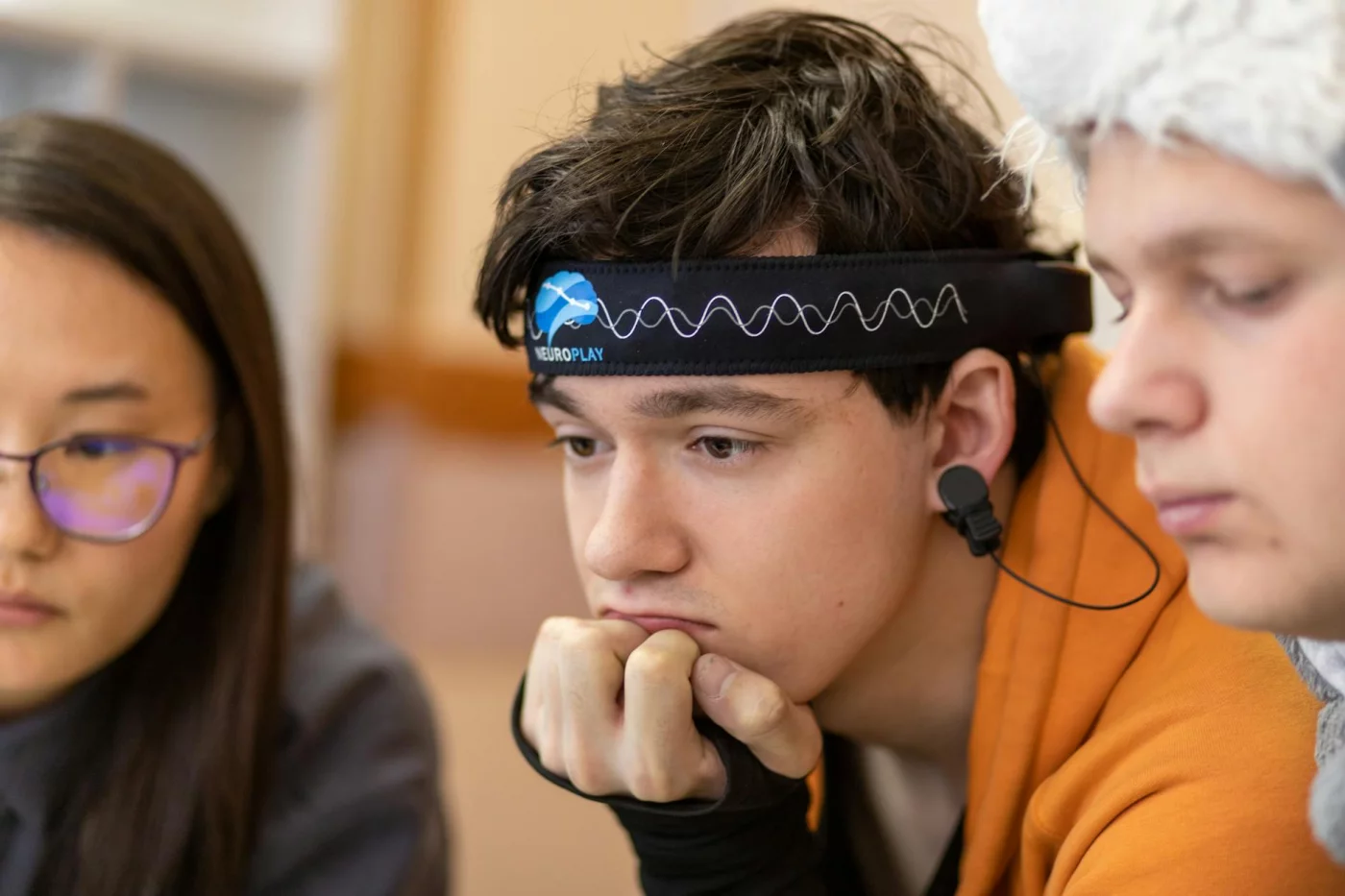 How to Study for the SAT With 8 Brain-Based Strategies That Actually Help Teens using a neurotech headband in a group session demonstrate how to study for the SAT with focused practice