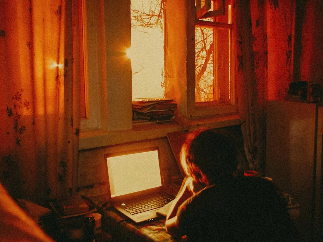 Is Chronotype Real? How Your Timing Affects Focus, Creativity, and Decisions Woman using laptop to explore circadian rhythm and cognitive performance, asking is chronotype real