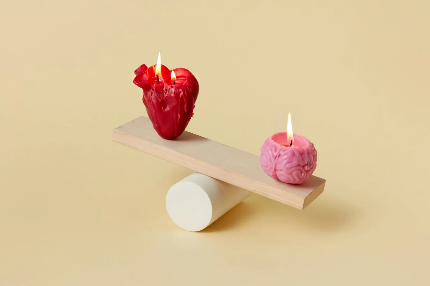 SMART Goals, OKRs, and Implementation Intentions for Students Execution gap concept with heart and brain candles on a seesaw, smart goals examples for students and OKRs