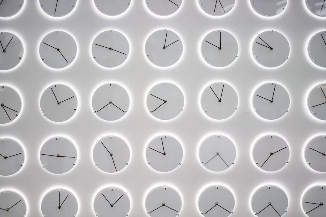 Wall of clocks illustrating spaced repetition for long term retention and the science of timing review intervals