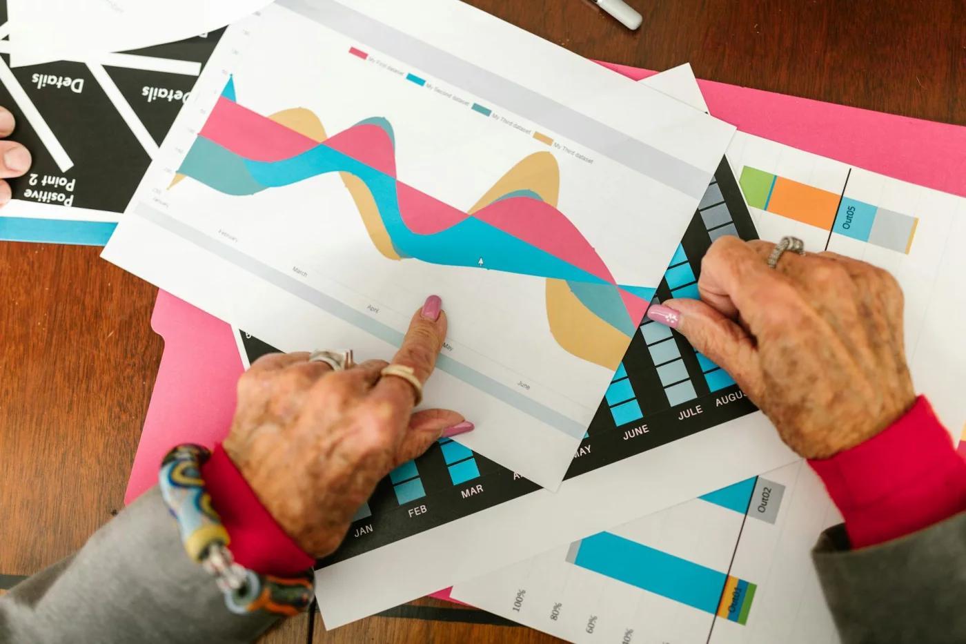 Ultradian Rhythms for Studying: 7 Smart Ways to Use 90-Minute Blocks Senior adult reviewing charts and planning a 90-minute ultradian cycle for studying at a wooden table
