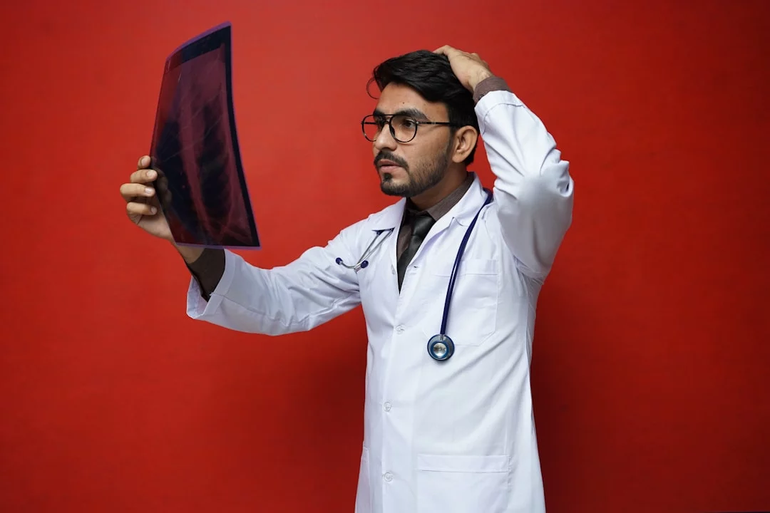 Active Recall for Medical School: A Practical Study Workflow Doctor with clipboard showing what is active recall for med school across anatomy, physiology, pathology, and pharmacology