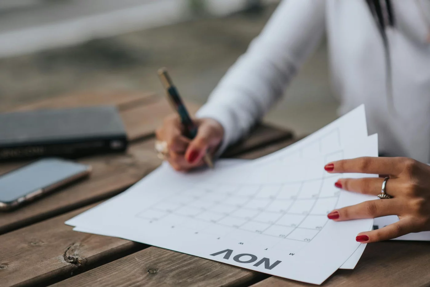 6-Month MCAT Study Schedule: A Realistic 24-Week Plan Planner and study blocks on a table illustrate a 6 month mcat study schedule balanced with real life demands