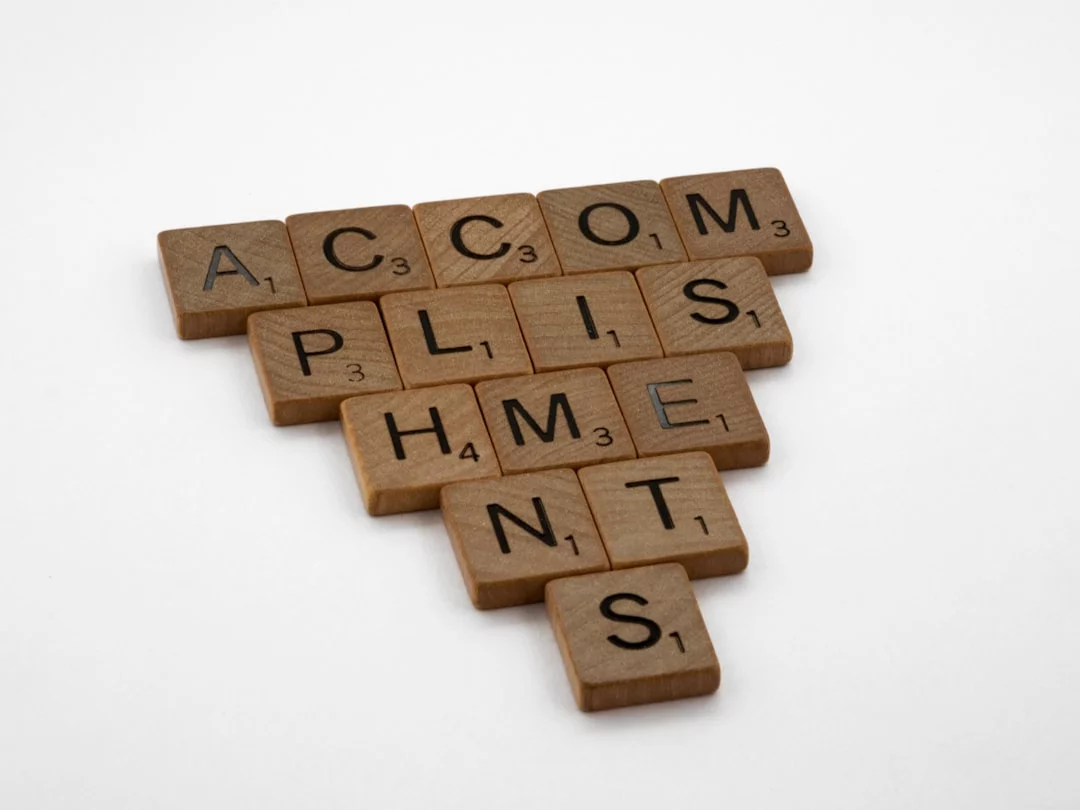 Acronym and Acrostic Mnemonics: Which Works Best for Recall? Wooden blocks on a white surface illustrating what acrostic mnemonic examples help the brain remember
