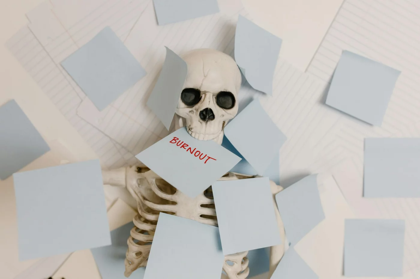 Anki vs SuperMemo vs RemNote: Which SRS App Fits You Best? Skeleton covered in sticky notes labeled burnout, illustrating anki vs remnote reddit mistakes and bad advice