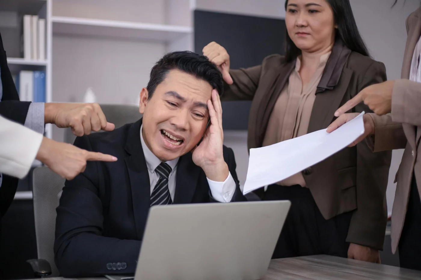 Office conflict shows one of the chronic stress examples linked to episodic acute stress at work
