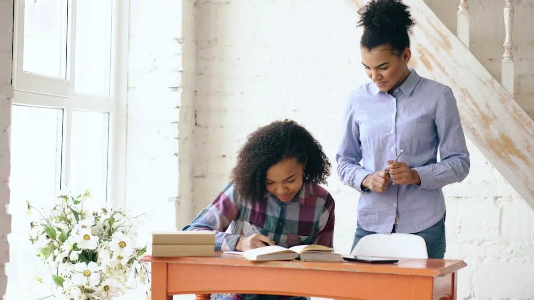 How Test Anxiety Affects Students and Which Study Skills Help Most Tutor helps a student with homework, addressing the effects of test anxiety on students through calm study support