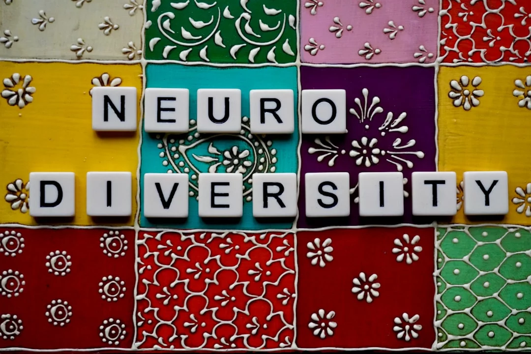Scrabble tiles spelling neuro university, illustrating how do you increase neuroplasticity in the brain with age