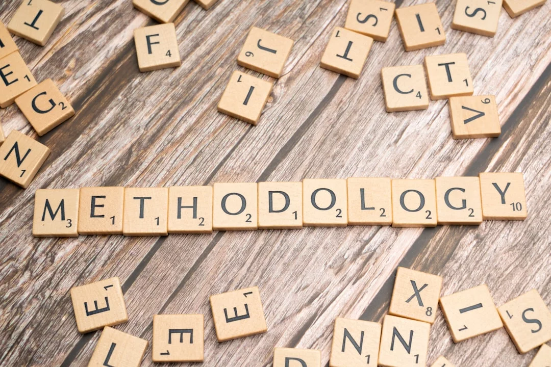 How to Learn Better Right Now With 7 Science-Backed Methods Scrabble tiles spelling method on wood, illustrating how to learn better by choosing the right study approach