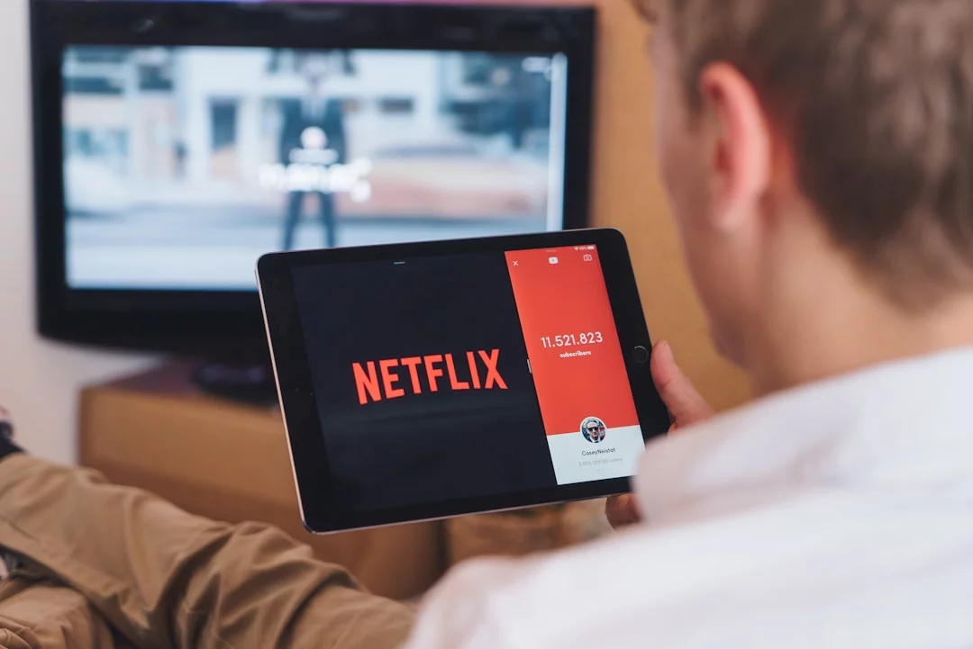 How to Learn a Language With Netflix in 7 Smart Steps Man watching Netflix and exploring how to learn language with netflix through shows and subtitles