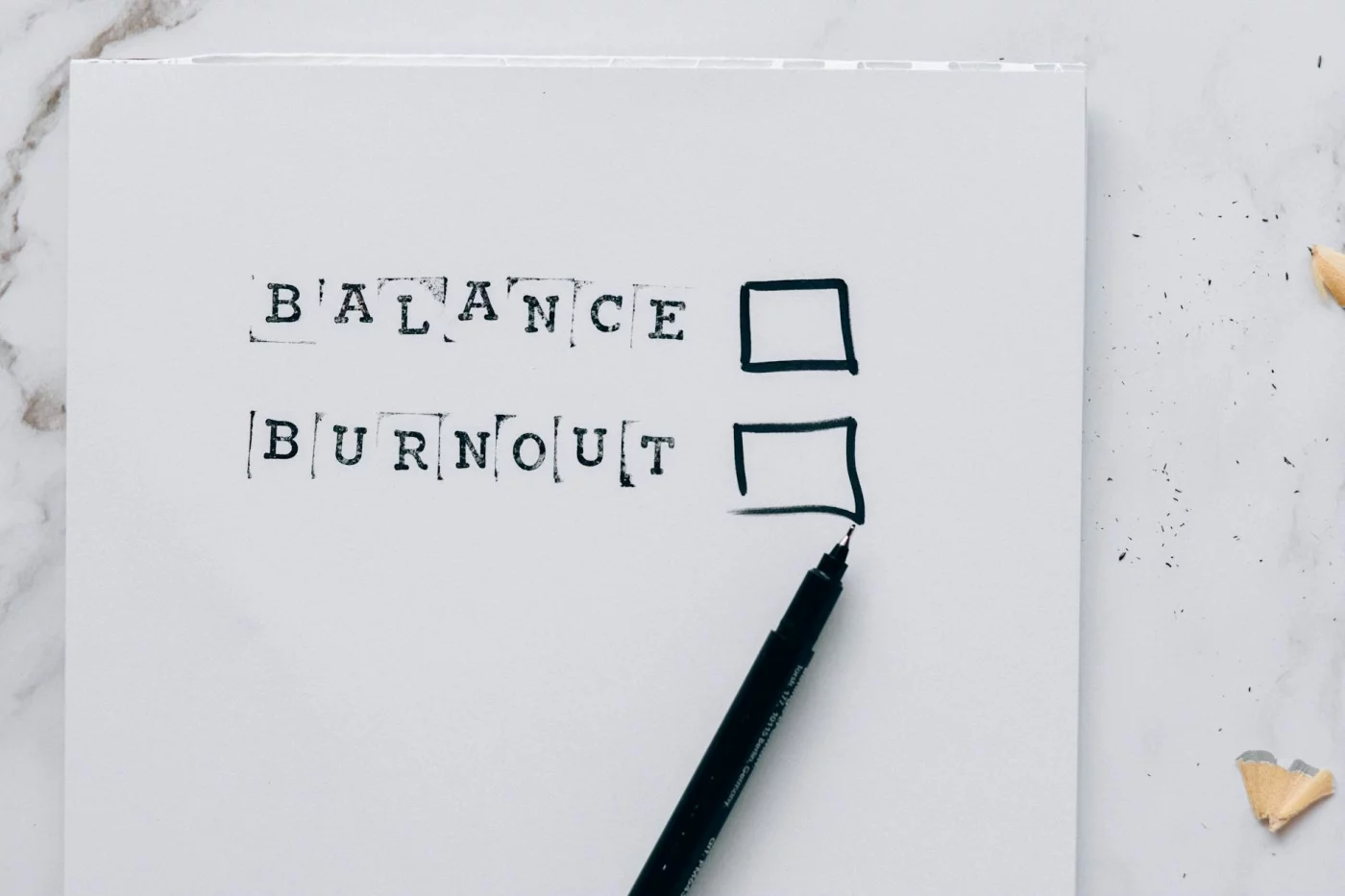 Toxic Productivity Explained: 7 Clear Ways to Escape Hustle Culture Minimalist balance vs burnout checklist illustrating hustle culture meaning and its harmful effects