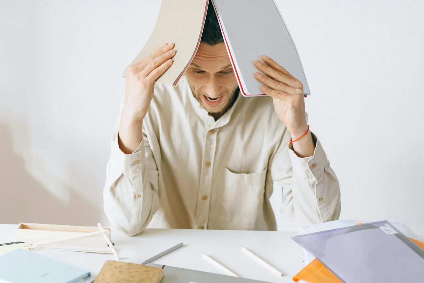 Is Memory Loss From Stress Reversible? What Stress Really Does to Memory Stressed office worker at a desk, showing what stress memory problems feel like—is memory loss from stress reversible?