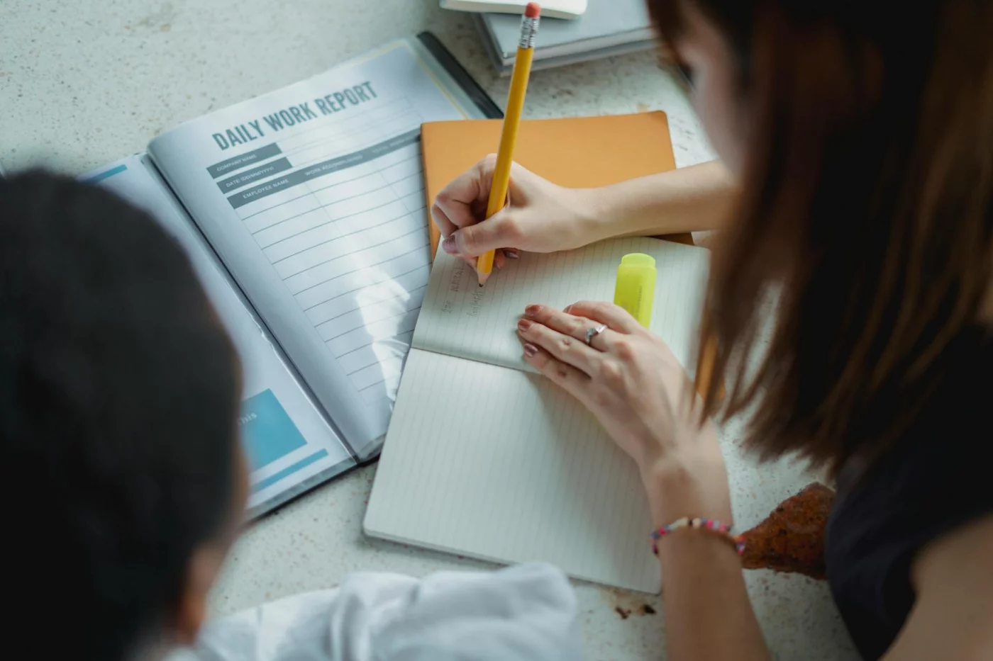 Shared vs Personal Note-Taking: When Sharing Notes Helps, Hurts, or Crosses a Line Students reviewing notes together for a quick reference on mistakes to avoid and is sharing notes academic misconduct
