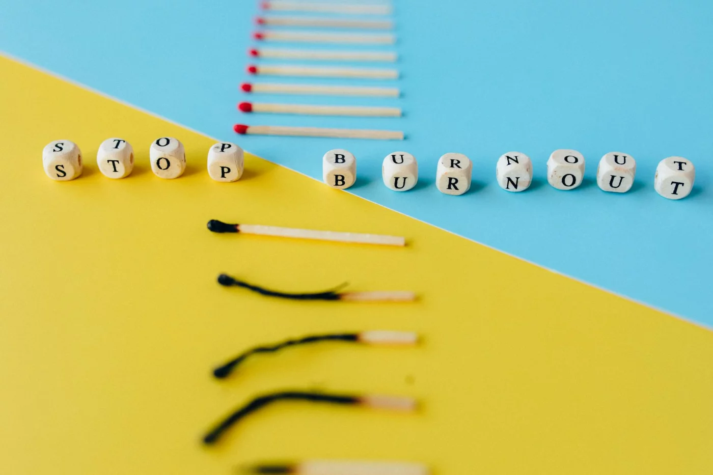 Workplace Burnout: 5 Stages and the Signs to Watch Dice and matchsticks illustrate the 5 stages of burnout and key physical symptoms of burnout at work