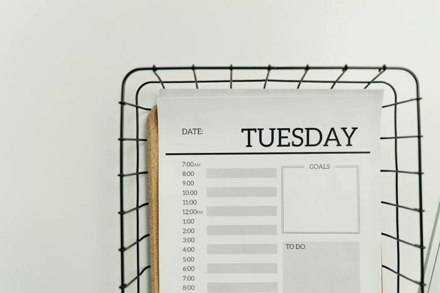 Tuesday planner on a wire basket illustrating time management tips for students and weekly study scheduling