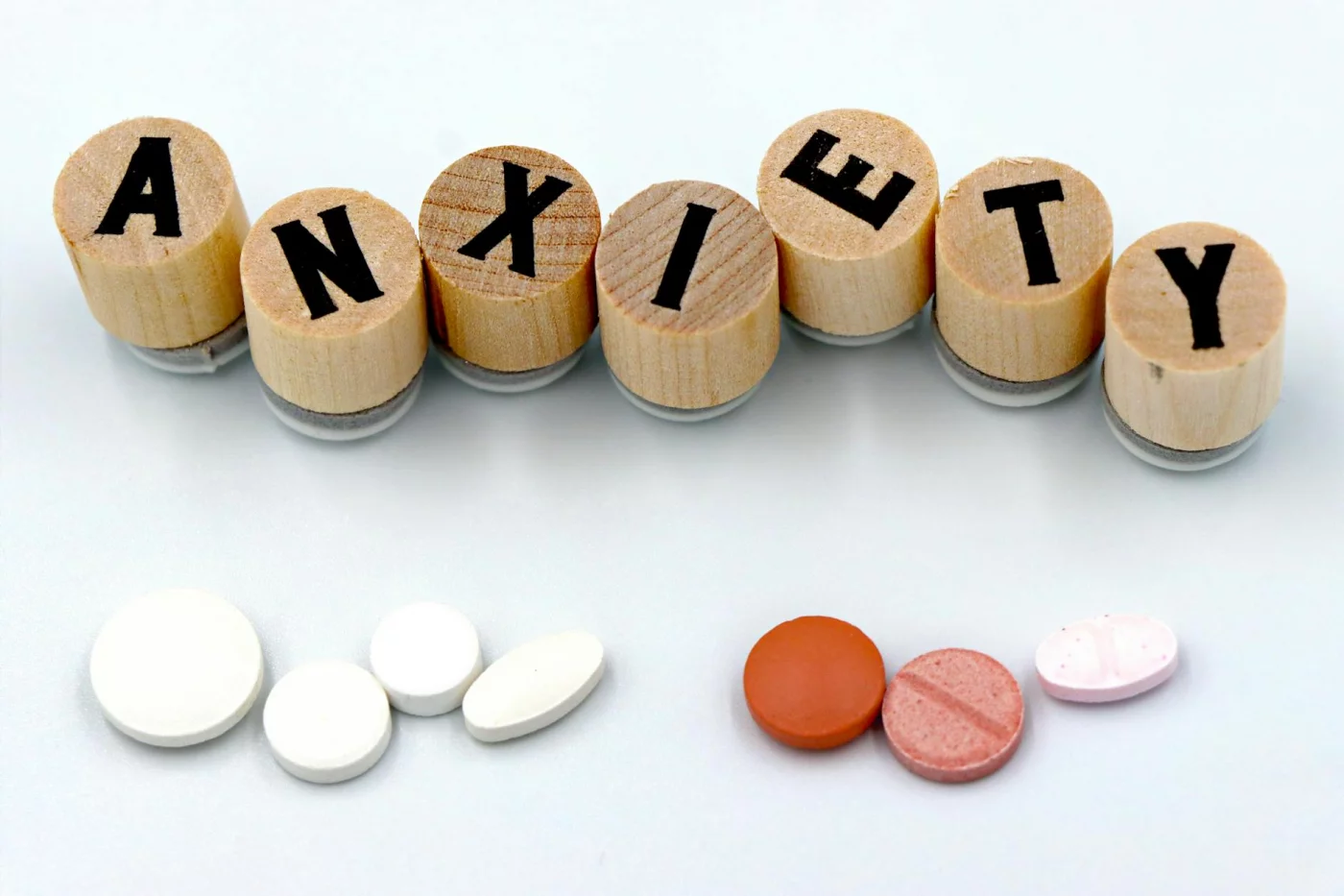 What Causes Memory Problems? The Main Causes by Age and Situation Anxiety blocks with assorted pills, illustrating what medications cause memory issues and other common triggers