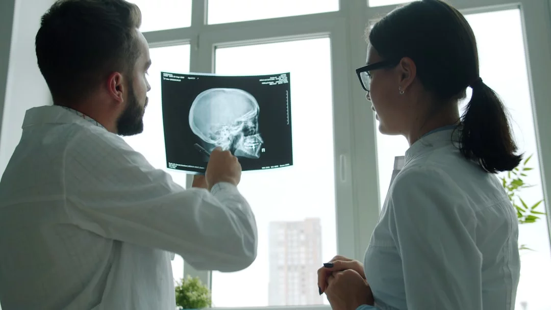 What Part of the Brain Controls Motivation? Doctors review a skull X-ray while discussing what part of the brain controls motivation and dopamine's role