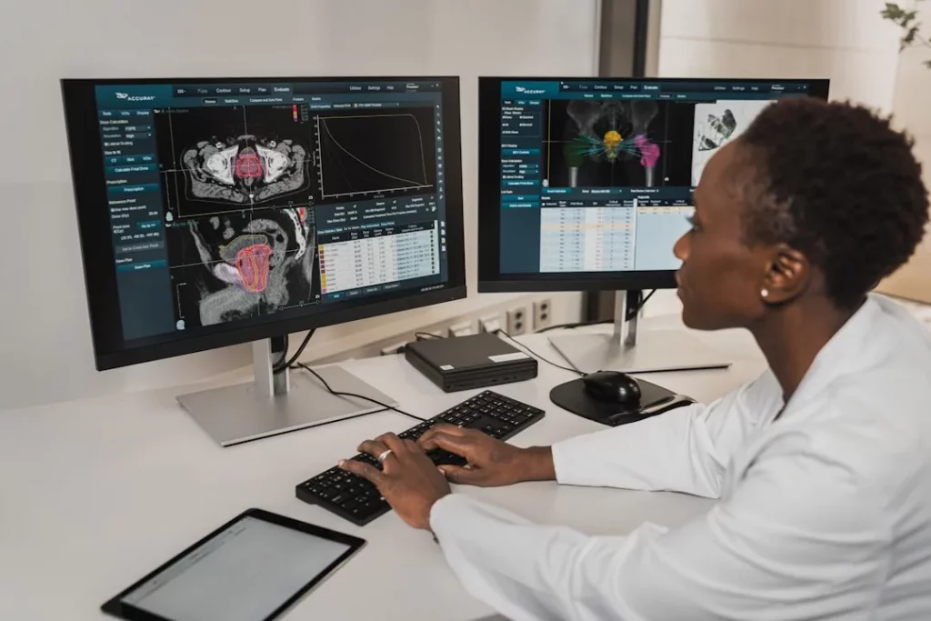 Man working on a computer while researching addicted brain vs normal brain differences