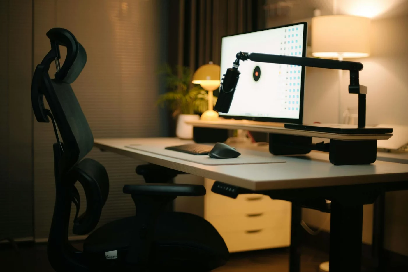 Brain-healthy home office setup showing what is the 20 8 2 rule with ergonomic chair, monitor, and soft lighting