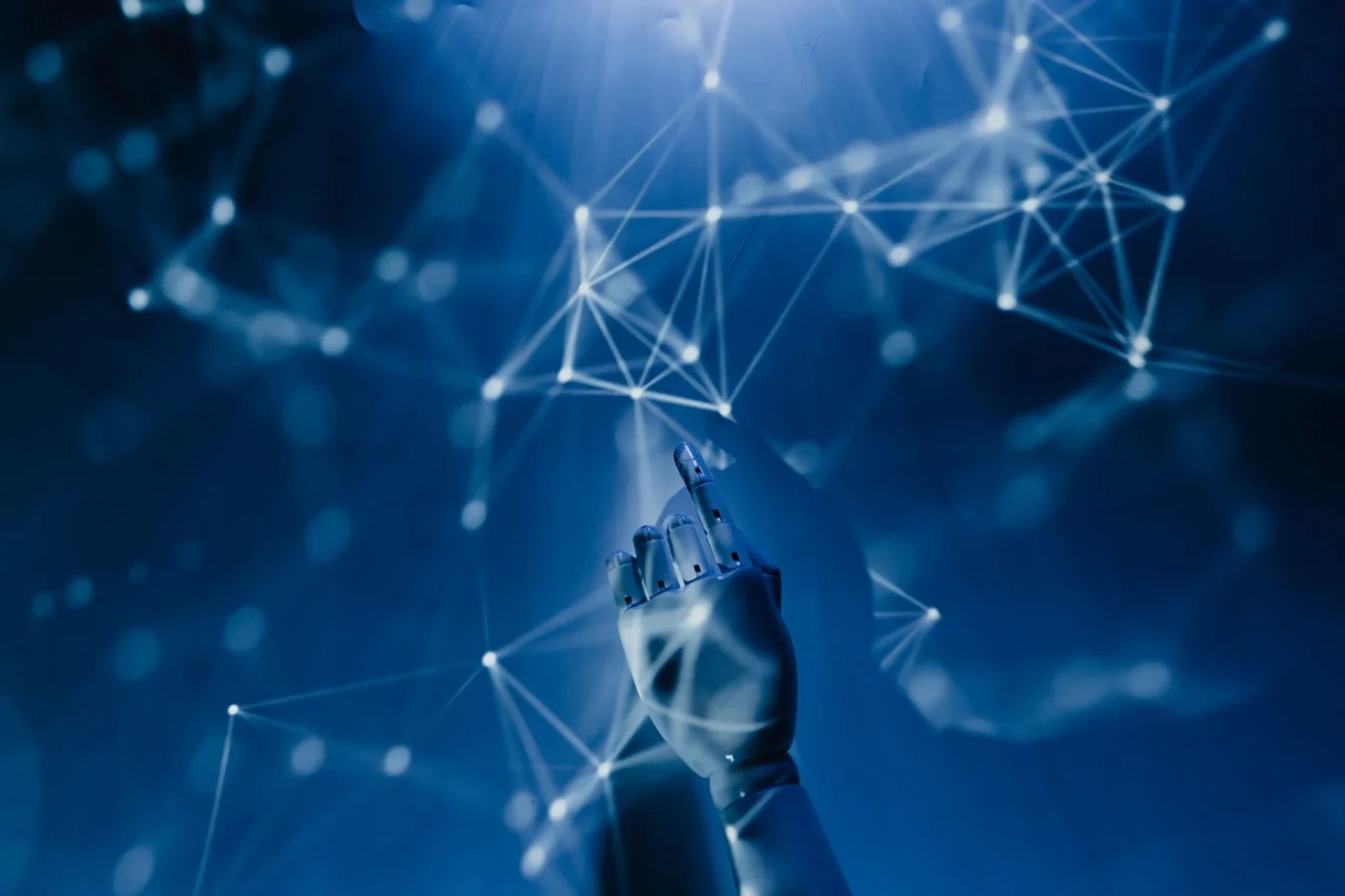 How to Use AI Productivity Apps Without Hurting Deep Learning Robotic hand in a digital network illustrating how ai productivity apps support search, automation, and deep work