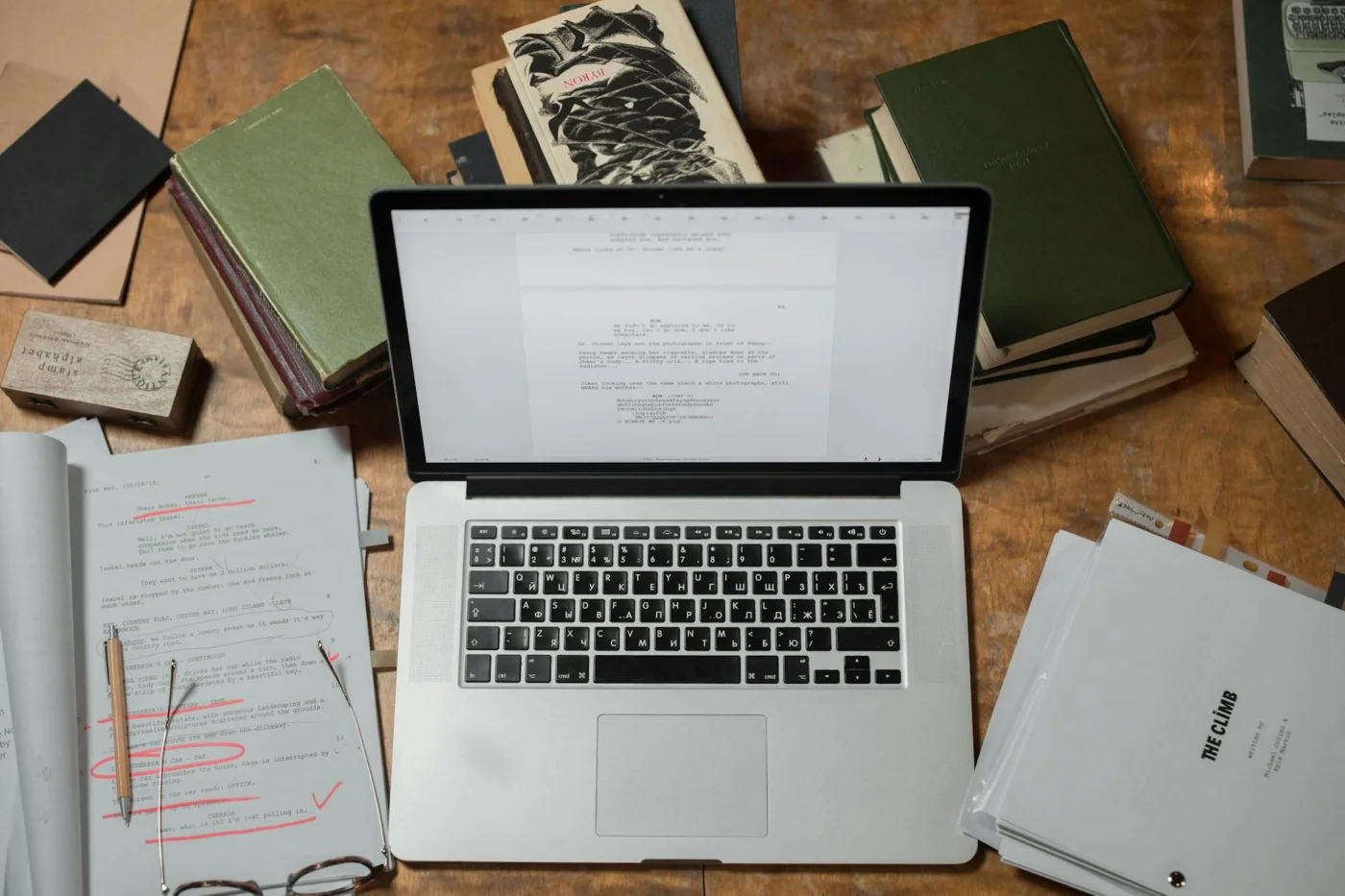 Why PubMed Is Trending and How to Use It for Better Research Laptop with books and notes on a desk, showing why use PubMed for research in a beginner-friendly workflow